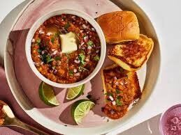 Pav Bhaji Served with three dinner buns
