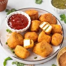 Paneer Pakoras (12 pcs.) Batter-fried pressed cheese, filled with tangy masala
